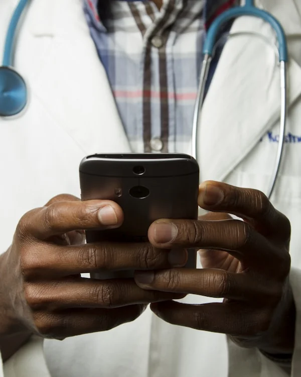 Healthcare operations professional reviewing workflow data